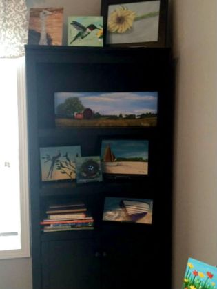 The new bookcase - perfect for displaying my paintings!